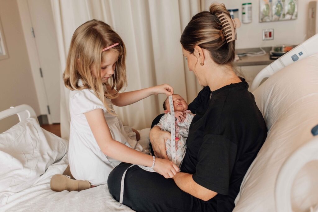 Big sister at a fresh 48 newborn session in the hospital