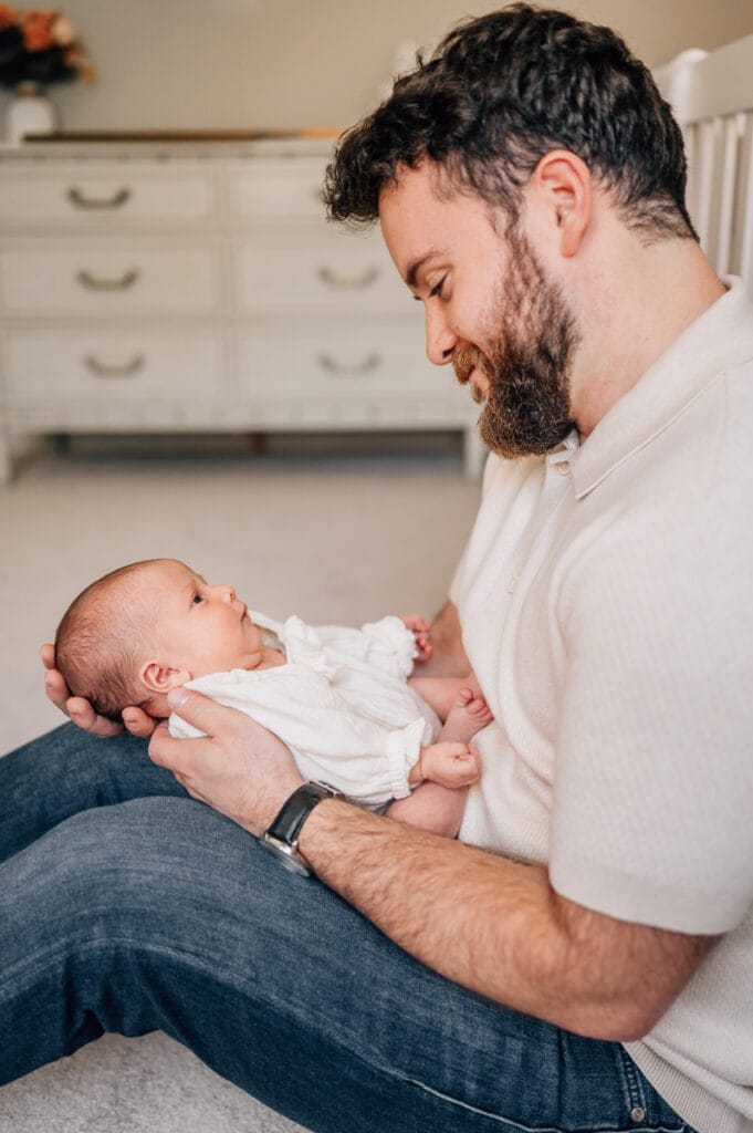 Daddy and baby during in-home newborn session