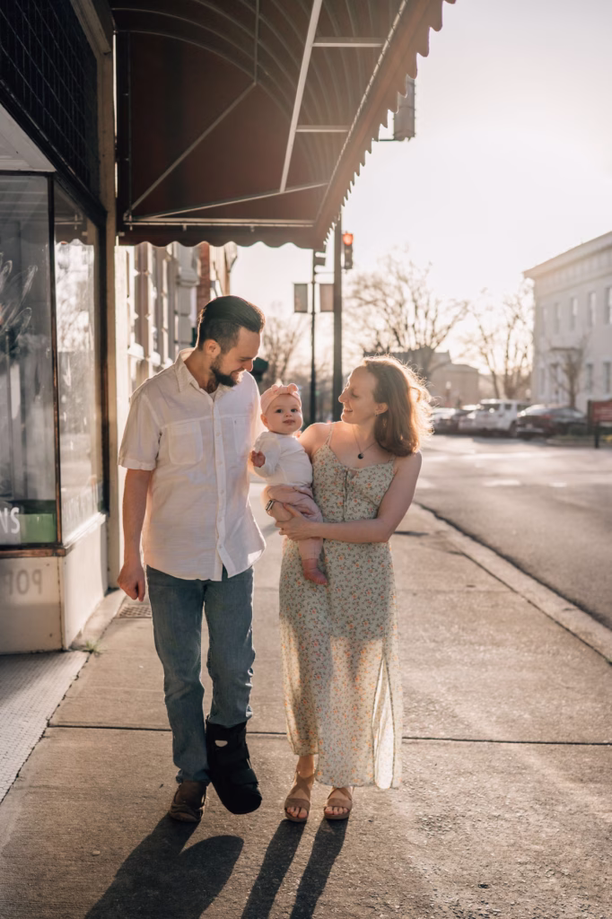 Parents walking downtown with their baby girl looking for the best playground in Columbia SC.